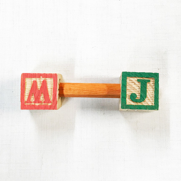 Barbell and bird, the first one is the clown of birds, Mr. or Ms. Caique.  Some birds can do a single foot lift with this barbell foot toy without a "OUCH"!  "Easy job" so the birds say!