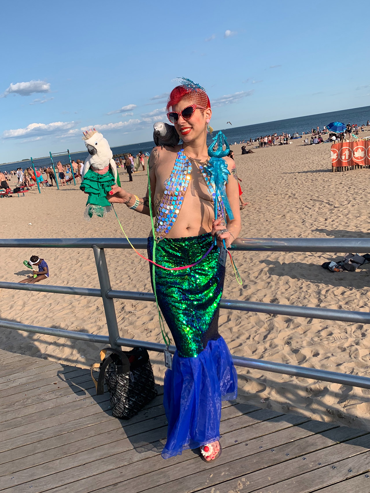 This photo was taken this June 2019 at the Coney Island boardwalk when we went to the Mermaid Parade! We love taking lots of fun day trips together as a family during the summer whenever we can!