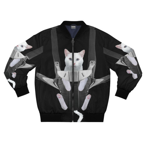 A funny tabby cat sitting in a baby carrier on a bomber jacket