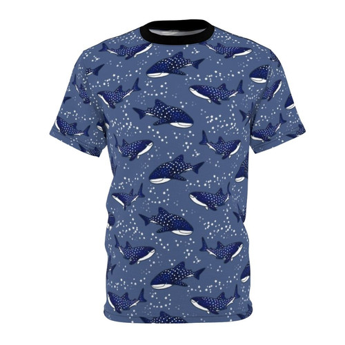 A t-shirt design featuring a starry night sky background with a cartoon whale shark in dark blue colors.