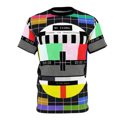 A t-shirt featuring a retro, high-contrast graphic design with a "standby" television transmission effect and glitch-inspired elements.