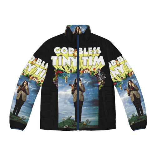 Tiny Tim wearing a puffer jacket with the "God Bless Tiny Tim" text