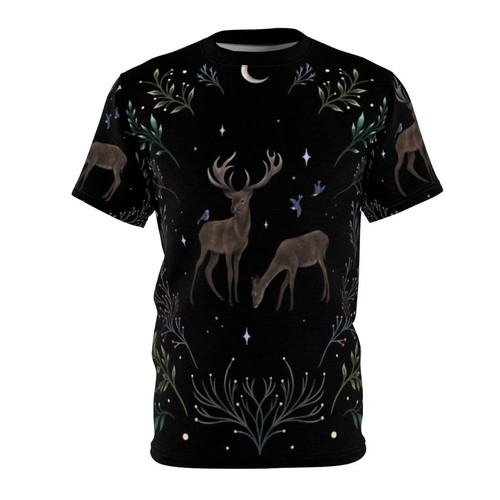 A cozy t-shirt featuring a whimsical moonlit forest scene with deer, snowflakes, and a starry night sky.