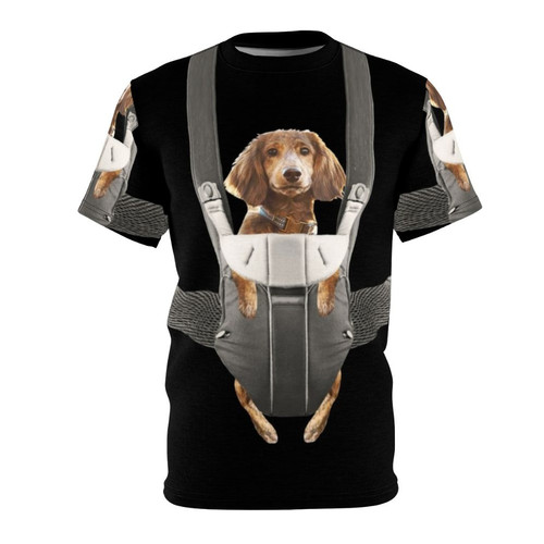 Illustration of a dachshund dog sitting in a baby carrier on a t-shirt
