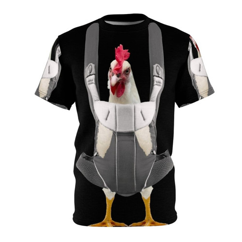 A person wearing a t-shirt with a graphic of a chicken sitting in a baby carrier.