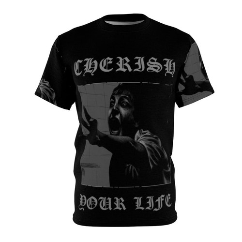 A black and white graphic t-shirt design inspired by the popular horror movie Saw, featuring the characters Adam Stanheight and Leigh Whannell in a goth/gothic style.