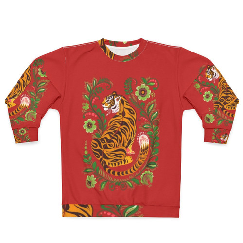 Vibrant tiger folk art design on a red sweatshirt