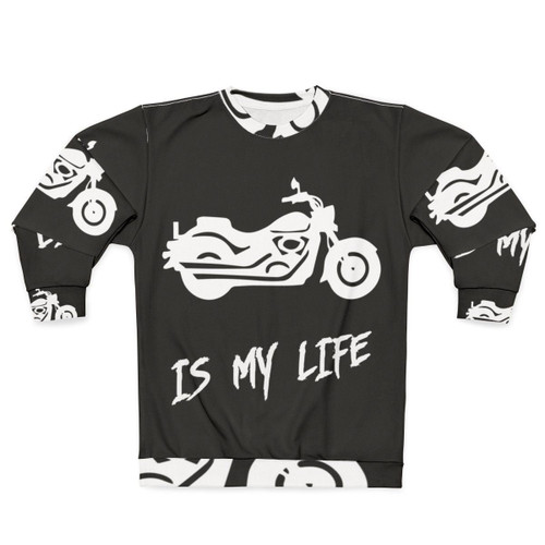 Motorcycle enthusiast wearing a sweatshirt with "Motorcycle Is My Life" printed on it.