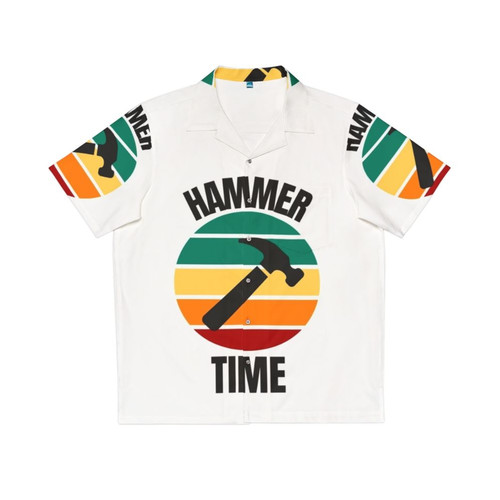 Carpenter holding a hammer wearing a Hawaiian shirt