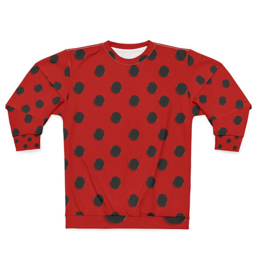A model wearing a cozy ladybug-themed sweatshirt