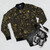 Magical bomber jacket with occult and witchy design elements - Flat lay