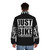 Motorcyclist wearing a puffer jacket with the text "Just One More Bike I Promise" - men back