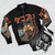 A stylish black bomber jacket featuring a Takaiju monster illustration, perfect for urban streetwear. - Flat lay