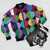Geometric moon pattern bomber jacket with colorful shapes and textures - Flat lay