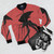 War of the Worlds inspired bomber jacket featuring classic sci-fi elements - Flat lay