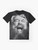 Graphic T-Shirt featuring a design with the text "Blessed Brian!" and a portrait of the British actor Brian Blessed. - Flat lay