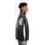 Jean Louis Aubert in a stylish black and white portrait puffer jacket - men side right