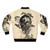 A black and white bomber jacket with a surrealist design featuring a skull, leaves, and birds in a nature-inspired pattern. - Back