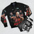 A brown bomber jacket with a graphic design featuring the words "Perc Angle" and images of a wrestling moon. - Flat lay