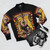 Bomber jacket with a graphic design of an eyeball kid in a circus sideshow setting. - Flat lay