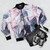 Hatsune Miku anime-inspired bomber jacket with colorful graphics and patterns - Flat lay