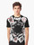 Graphic t-shirt featuring a design of falling playing cards in a surreal, Alice in Wonderland-inspired style. - Men