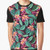 A dark graphic t-shirt featuring a vibrant floral Hawaiian pattern.