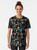 Botanical graphic t-shirt featuring colorful floral patterns in a trendy boho style - Women