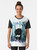 Whimsical "A Quiet Spot" graphic t-shirt featuring a watercolor monster reading books in a forest setting - Women