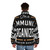 A warm, durable puffer jacket featuring the text "I'm a Community Organizer" - men back
