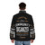 A puffer jacket with the text "I M A Community Organizer" printed on it. - men back