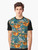 A happy, boho-style graphic t-shirt featuring a sloth surrounded by colorful floral patterns in teal, orange, brown, and blush. - Men