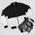 A bicolor geometric pattern bomber jacket in white and black colors. - Flat lay
