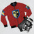 Crusaders bomber jacket with crossed axes and LEGO castle design - Flat lay