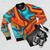 Colorful modern bomber jacket with vibrant southwest-inspired swirls and abstract designs - Flat lay