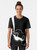 Vintage-style t-shirt featuring a graphic design of a violin bass guitar, a nod to the iconic Hofner bass played by The Beatles' Paul McCartney. - Women