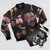 A black and white bomber jacket with a typography design featuring the name "Jonathan Frakes" and "Beyond Belief" text - Flat lay
