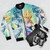 Dragon Ball Z anime-inspired bomber jacket with Kamehameha design - Flat lay
