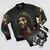 A bomber jacket featuring a beautiful image of Jesus Christ suffering on the cross, with a Christian message. - Flat lay