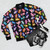 Colorful bomber jacket featuring a collage of Care Bears and Care Bear Cousins characters - Flat lay