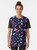 Vaporwave aesthetic graphic t-shirt with a repeating pattern design - Women
