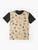 Graphic t-shirt featuring a pattern of cute shiba inu dogs in a cream background - Flat lay