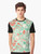 A vibrant graphic t-shirt featuring various Christmas baking elements like cookies, cupcakes, and candy canes. - Men