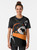 A graphic t-shirt design featuring a shark playing soccer on a black and orange background - Women