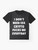 Vintage style graphic t-shirt with the text "Crypto Fucks Me Everyday" - a humorous and satirical take on the cryptocurrency industry. - Flat lay