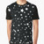 A black and white t-shirt featuring a scatter of stars and galaxies, creating a simple and minimalist space-inspired design.