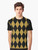 Model wearing a black and gold harlequin graphic t-shirt with a diamond pattern design - Men