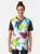 Retro 80s geometric graphic design t-shirt featuring a colorful grid pattern with triangles in pink, blue, white, green, and yellow. - Women