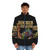 A cozy puffer jacket featuring a whimsical cartoon dragon design, perfect for fantasy and gaming enthusiasts. - men front