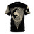 Photograph of a Norse-inspired t-shirt with a detailed wolf graphic, set against a background of celestial symbols and organic patterns.